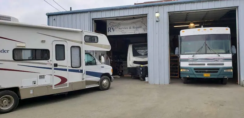 Tony's RV Service & Repair shop on E Lockhart Ave in Coos Bay, with motorhomes in the open bays